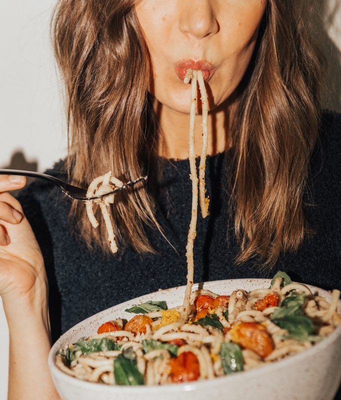 Camille Styles eating a bowl of pasta_easy vegetarian meals for one
